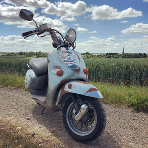 Max's scooter is back on the road..